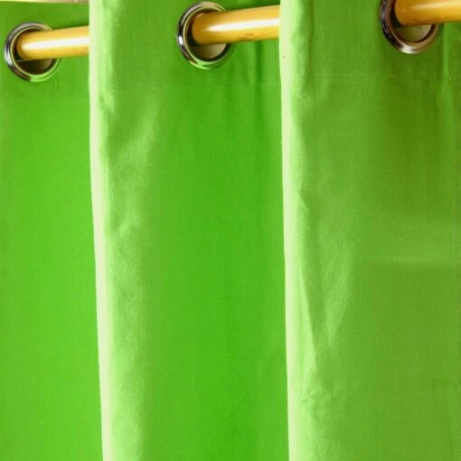 Cotton Plain Green Ready Made Eyelet Curtain Pair -Best Homeware Store solid green curtain close up shot